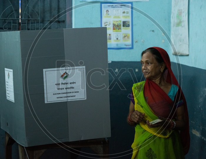 An Old woman in a Polling Station To Cast Her Vote for Elections In West Bengal