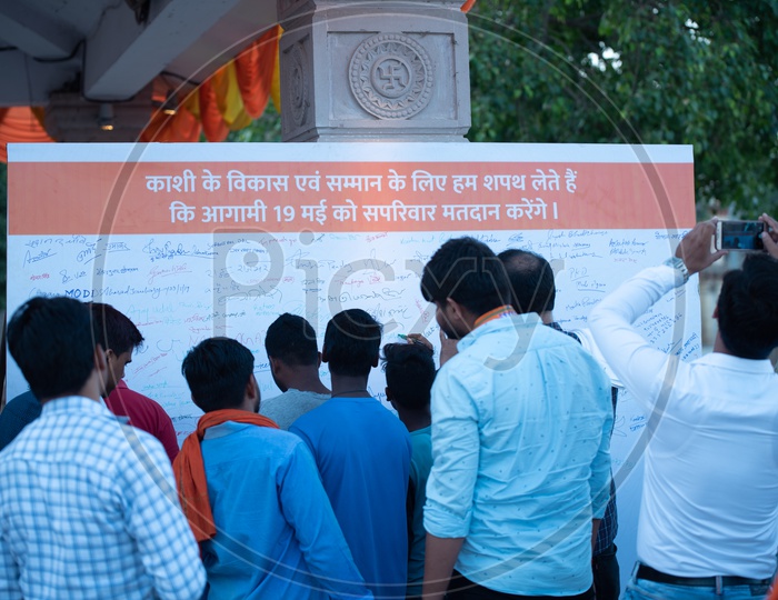 People Of Kasi Or Varanasi Sign on The Election Awareness Or oath to Vote Banner
