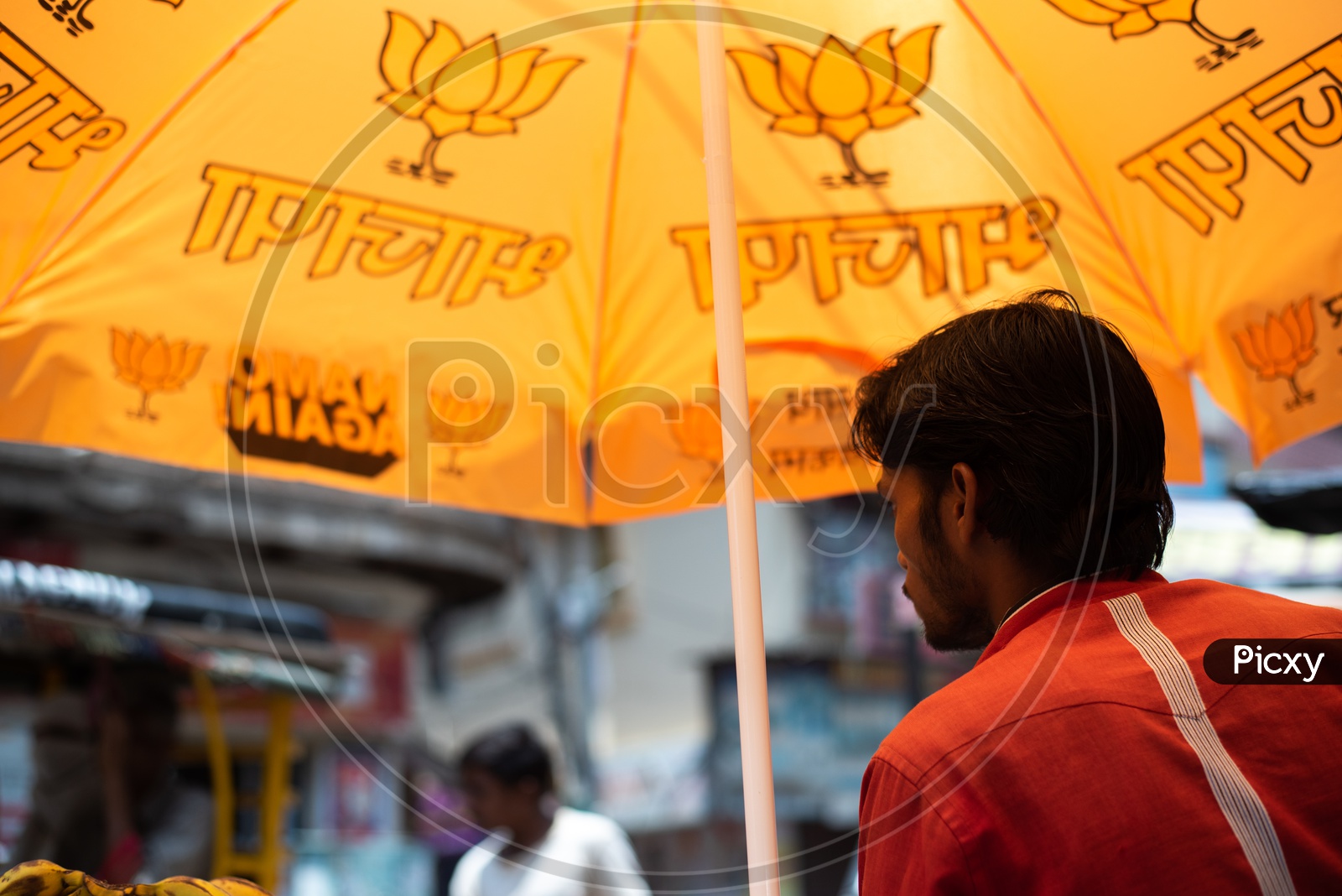 BJP Has Distributed  Umbrellas With BJP Party Symbols For Street Vendors  All Around Varanasi As Election Campaign  For  Lok sabha Election 2019