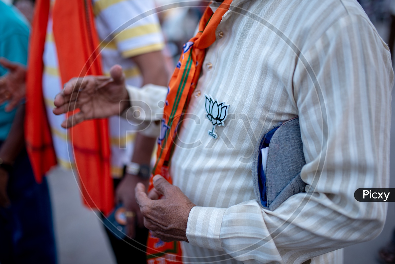 Modi Supporters Wearing BJP Party Flags And Lotus Symbol Badges During The Election Campaign For Lak Sabha General Elections 2019