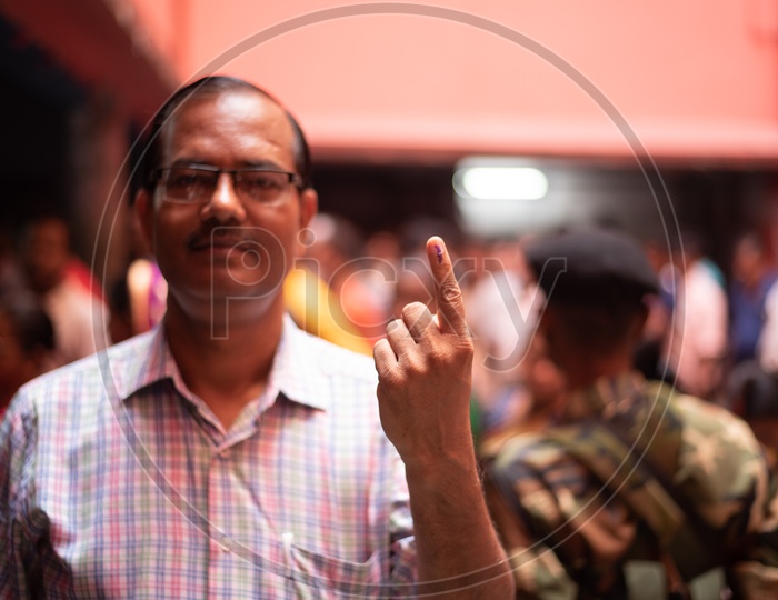Indian Voter Showing Inked Fingers After Casting Vote In Lok Sabha General Elections 2019 in west Bengal