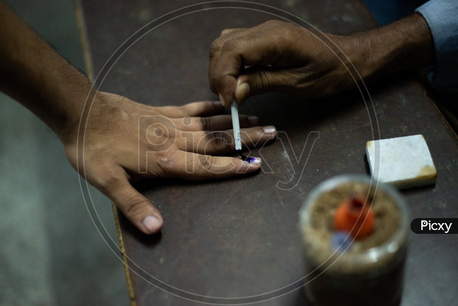 Voters Fingers Being Inked at a Polling Station at Polling Booths On Election Day