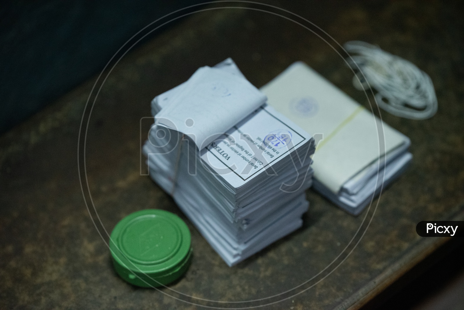 Voter Slips Bundles in a Polling Booth on a Election Day