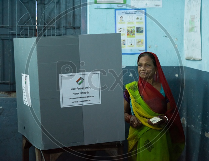 An Old woman in a Polling Station To Cast Her Vote for Elections In West Bengal