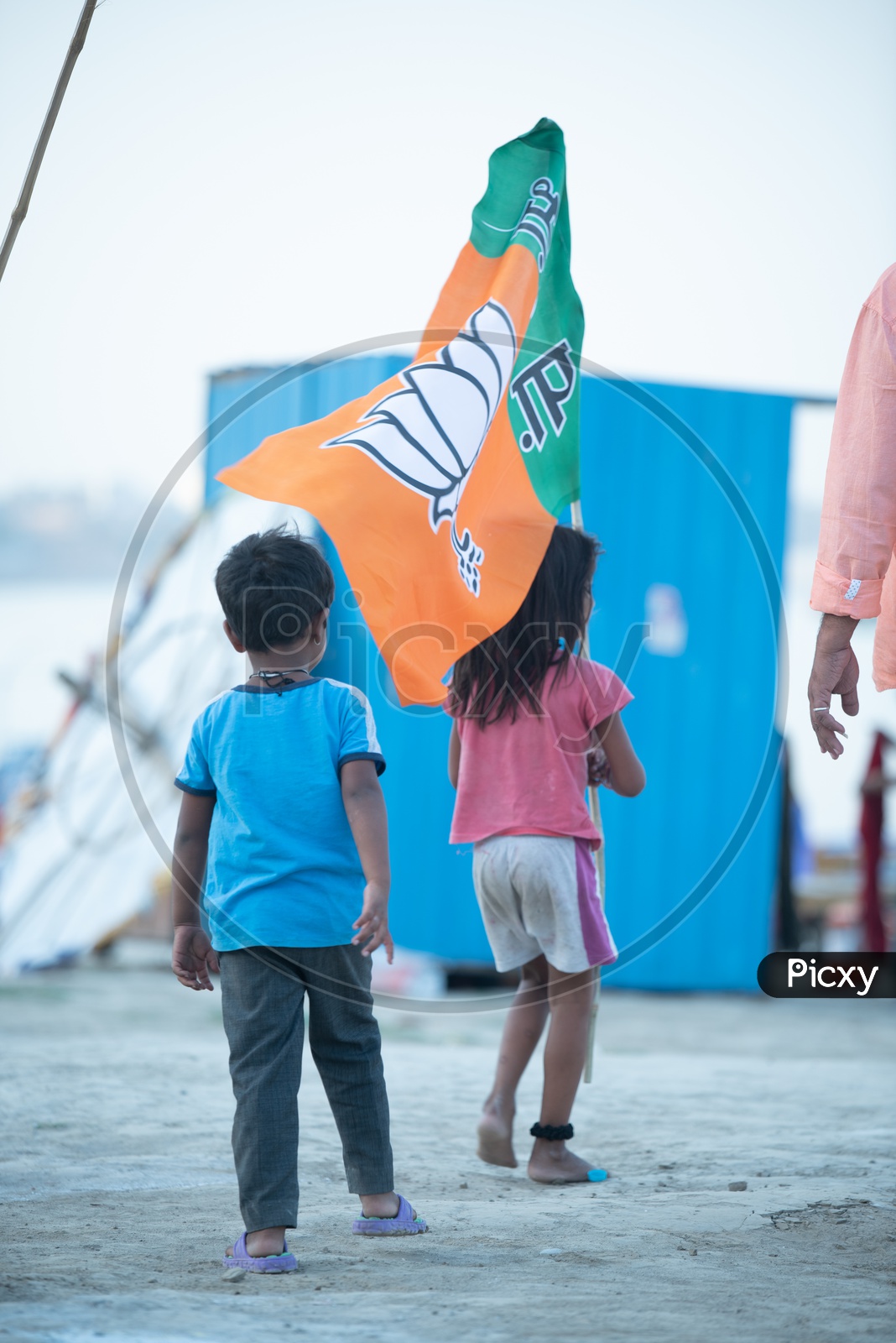 Children Holding The BJP Party Flags During Election Campaigns