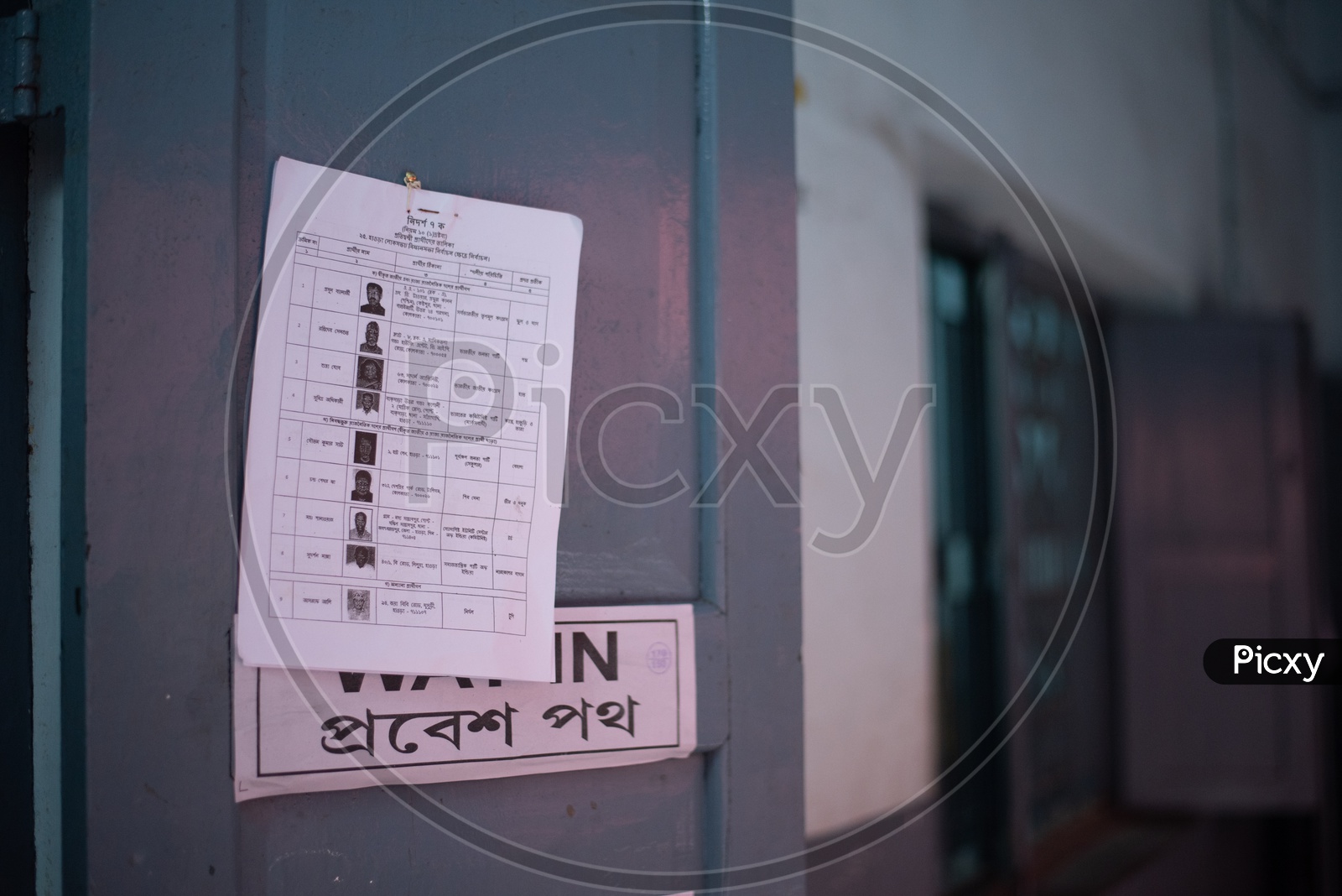 Voter List Paper Being Tagged In a Polling Station for Verification Of Voters
