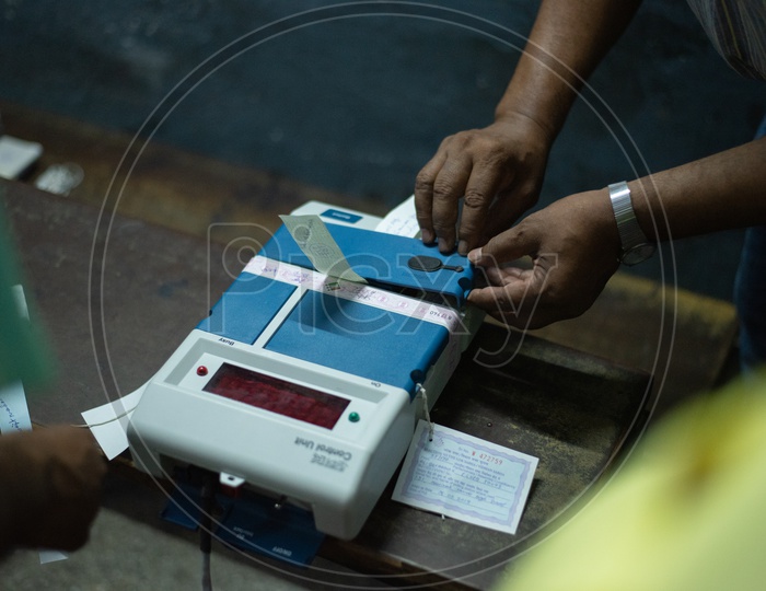 Election Commission Polling Booth Officer Sealing The EVM Control Unit  After The Election on a Election Day