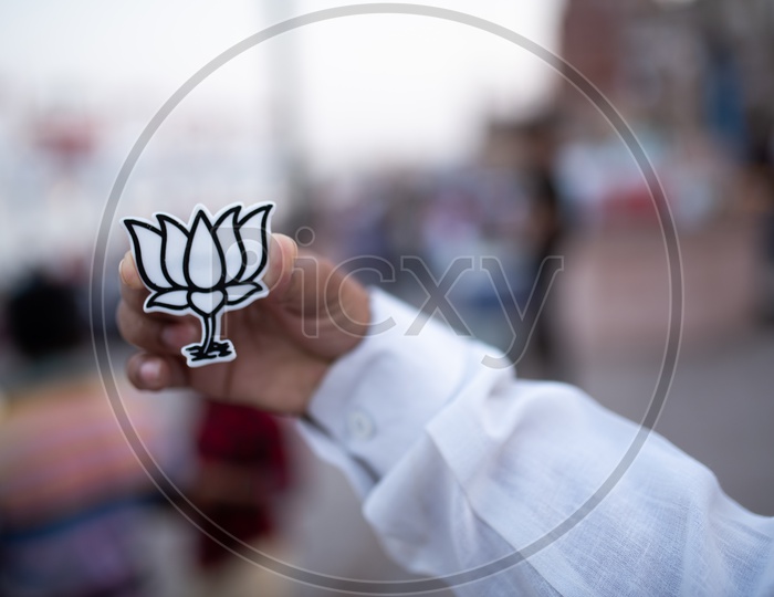 Modi Supporters  Holding  BJP  Lotus Symbol Badges During The Election Campaign For Lak Sabha General Elections 2019