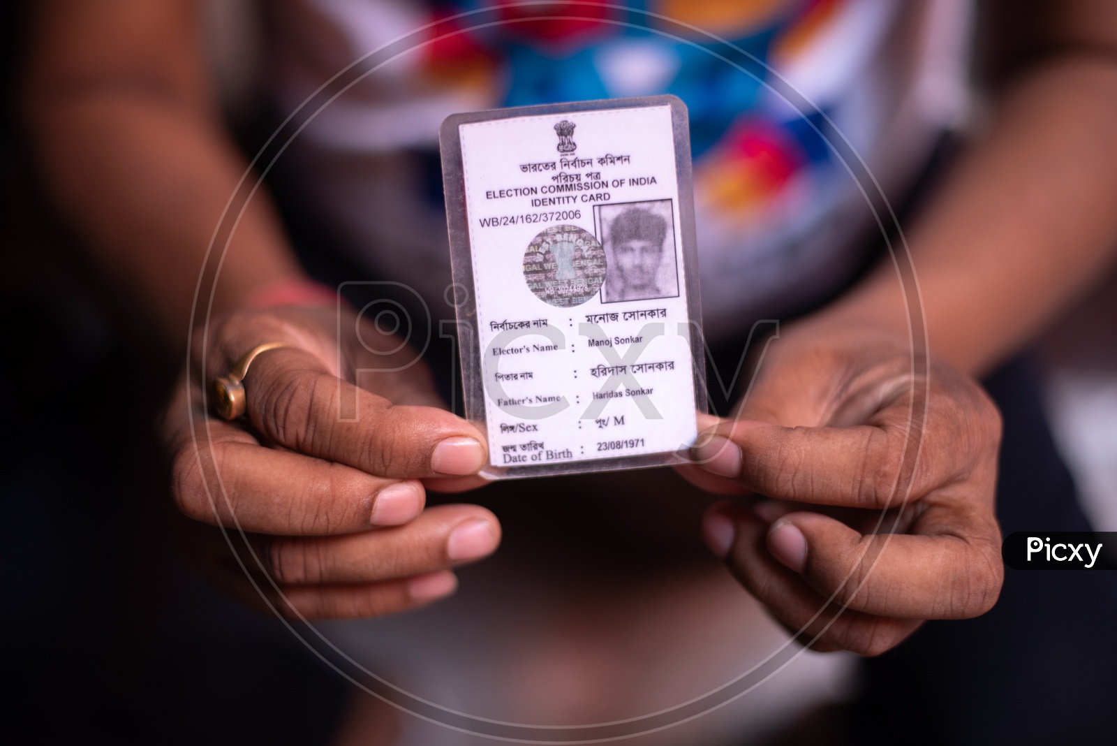 Indian Voters Showing The Voter Id Cards on Election Poling Day At Polling Booths