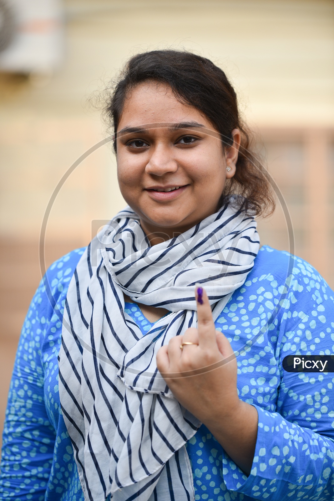 An Indian Young Woman  Showing The Inked Finger After Casting Her Vote In Lok Sabha General Elections  2019 in West Bengal