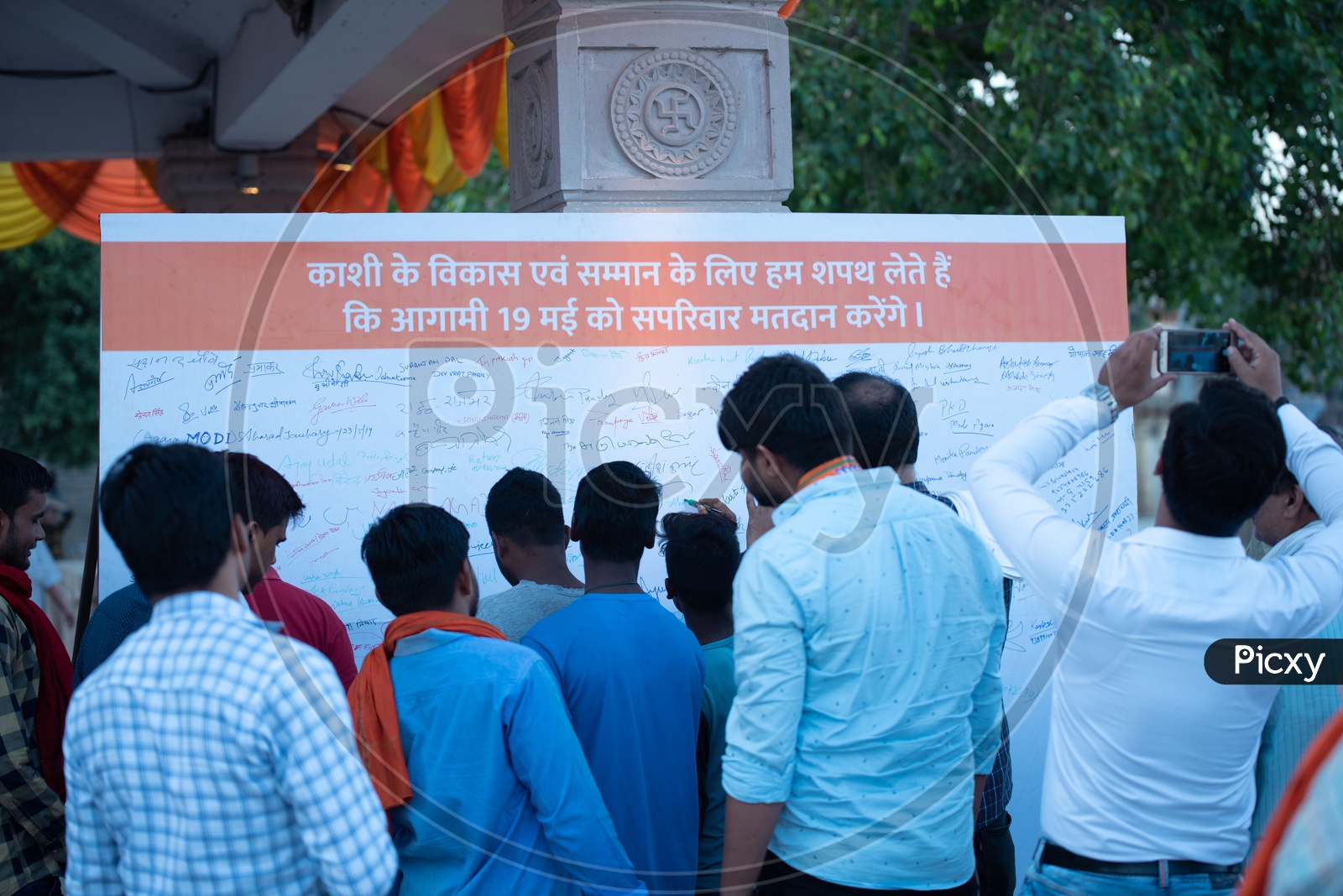 People Of Kasi Or Varanasi Sign on The Election Awareness Or oath to Vote Banner