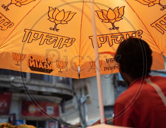 BJP Has Distributed  Umbrellas With BJP Party Symbols For Street Vendors  All Around Varanasi As Election Campaign  For  Lok sabha Election 2019