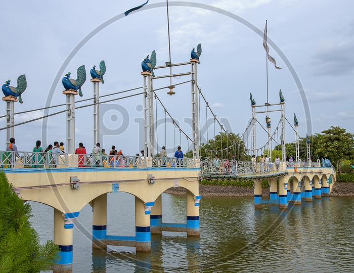 A Pathway Bridge Over an Water Body at Anand Sagar Temple