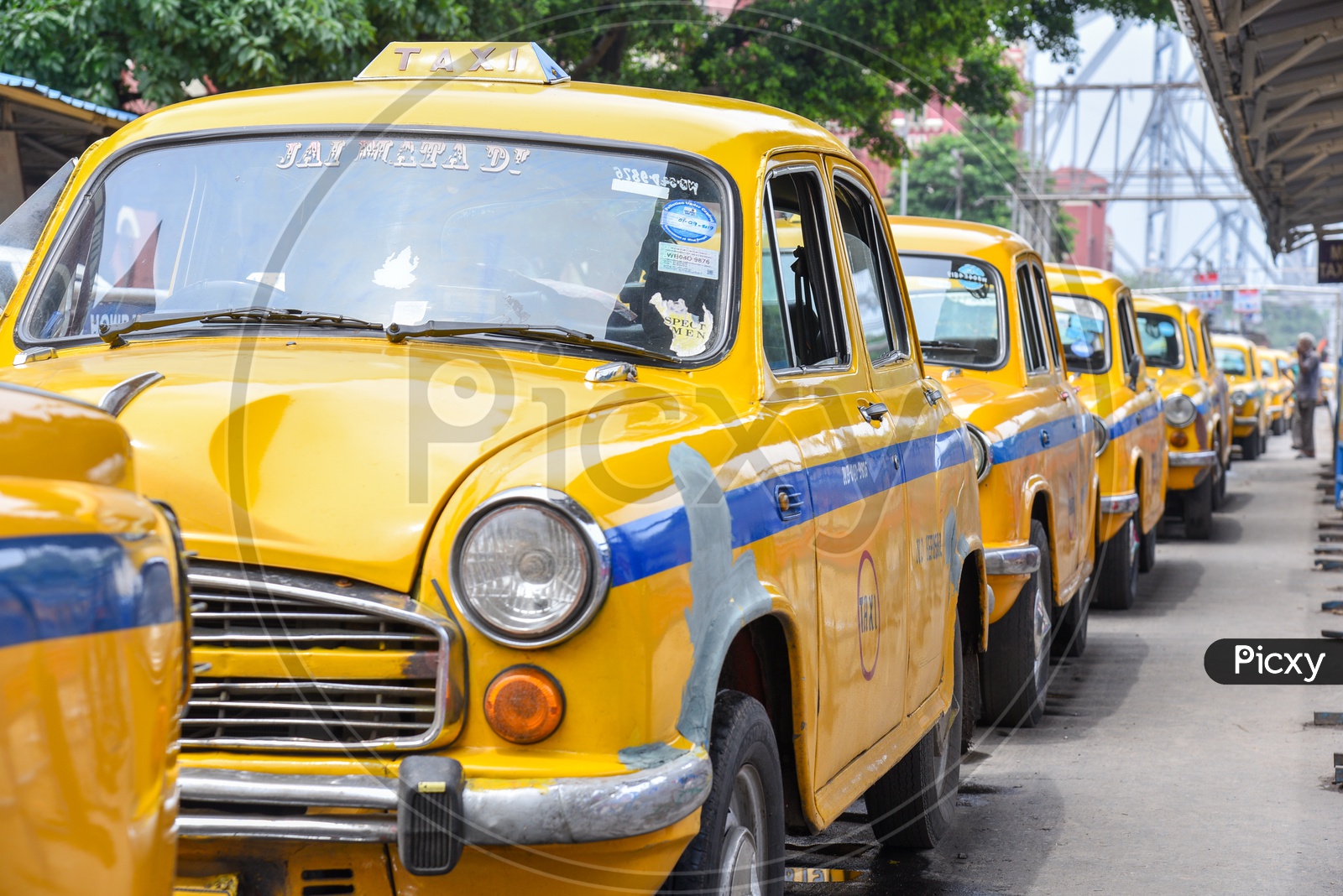 Yellow Color Cabs Or Taxi At Howrah Railway Station