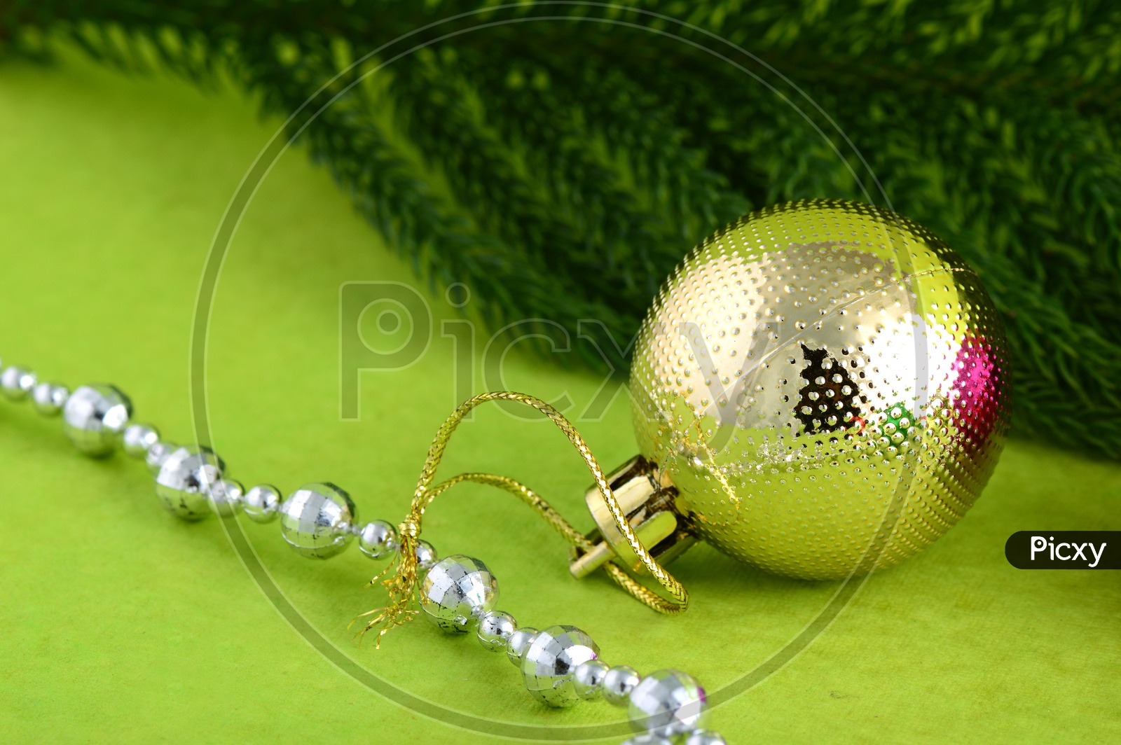 Christmas Decorative Color Balls And Christmas Tree Branch and Ornaments Filled Background For Christmas Wishes