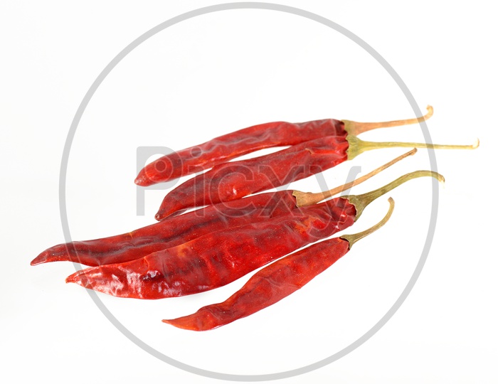 Red Chilli peppers isolated on white
