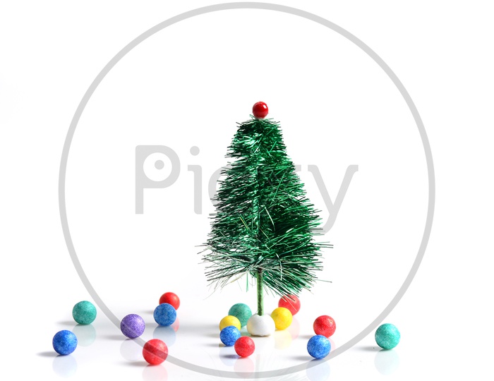 Christmas Tree With Decoration Balls on an Isolated White Background
