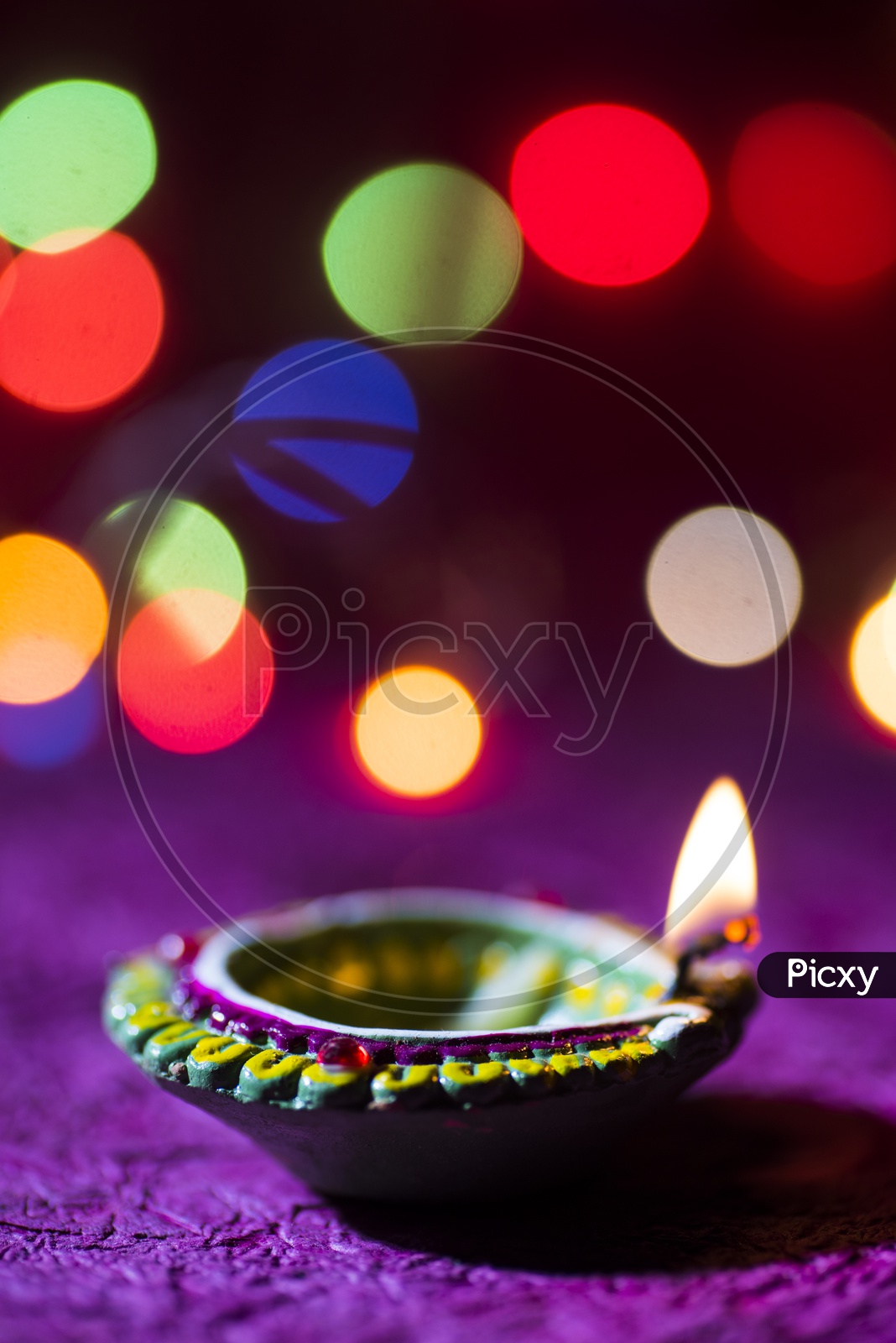 Indian Lights Festival Diwali Clay Diya Lamps With A Led Light Bokeh Background For Diwali Greettings Templates