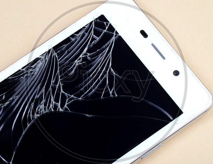 Smart Phone with broken screen On an Isolated Background