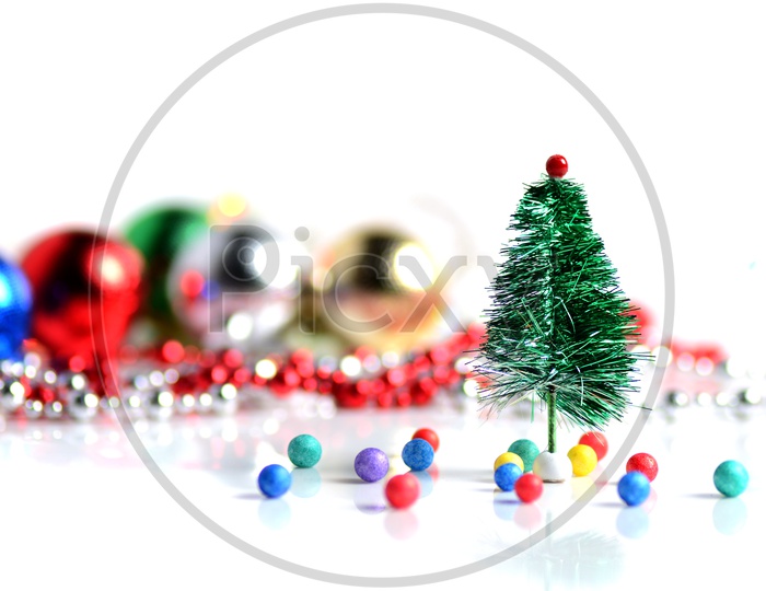 Christmas Tree With Decoration Balls on an Isolated White Background