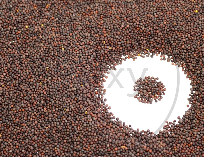 Black Mustard Seeds On a White table
