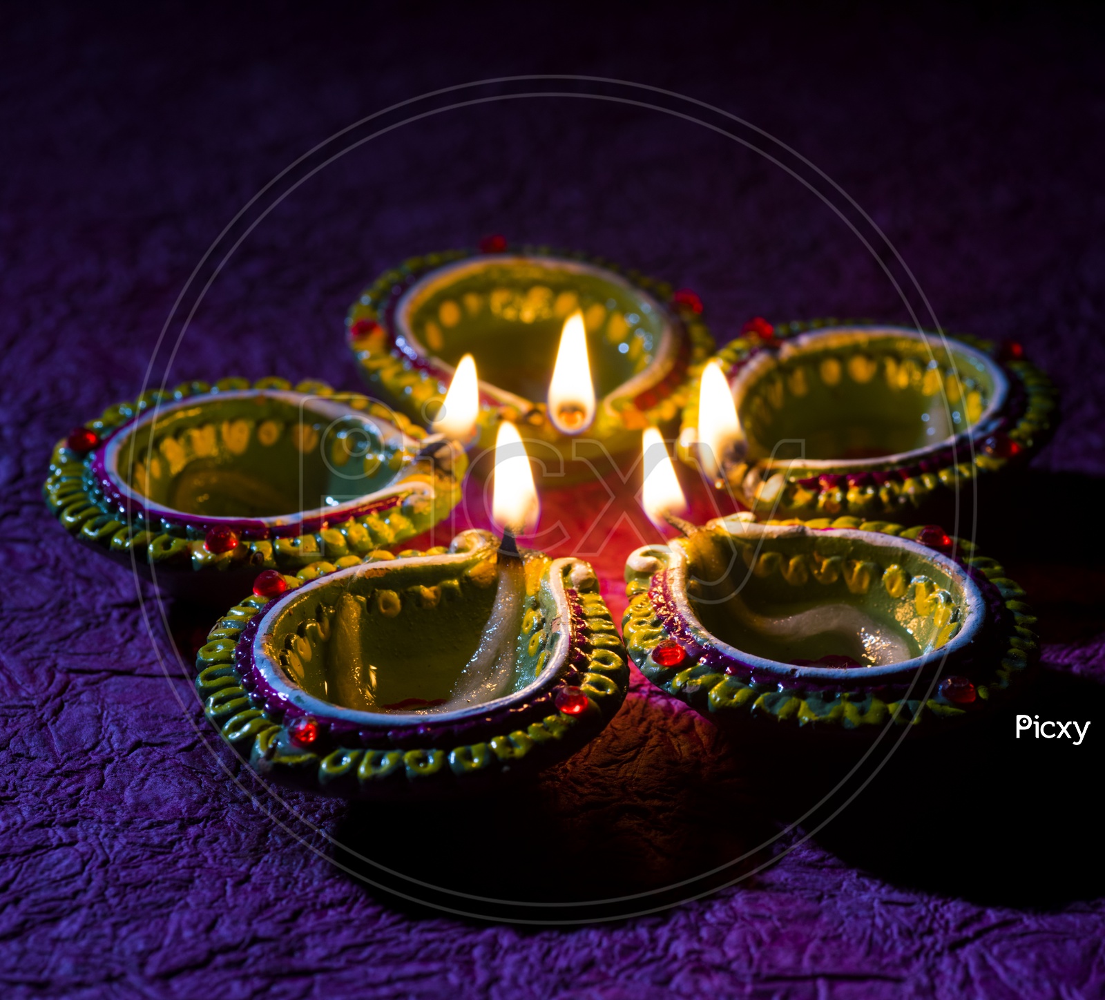 Indian Lights Festival Diwali Clay Diya Lamps With A Led Light Bokeh Background For Diwali Greettings Templates