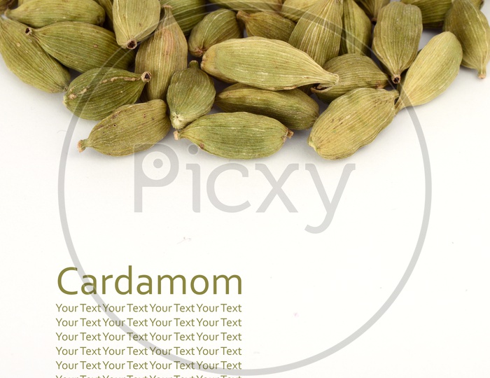Cardamom pods on white background