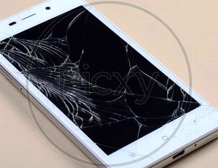 Smart Phone with broken screen On an Isolated Background