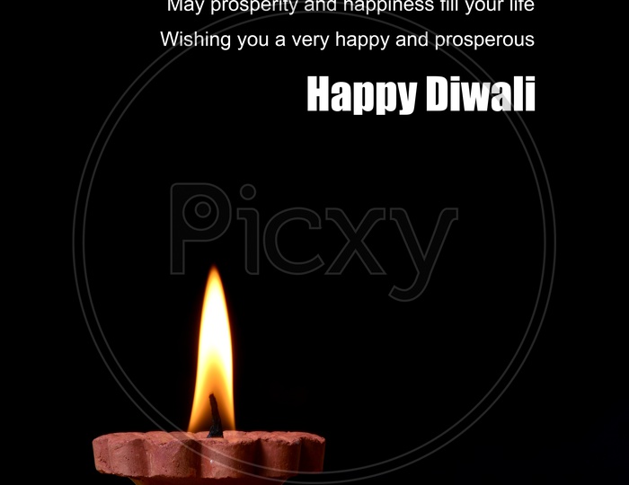 Indian Festival Diwali Clay Diyas In Colorful Rangoli For Diwali Greetings or Wishes Templates