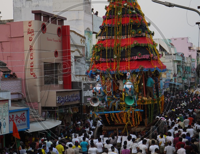 Hindu Devotees Pulling The Wooden Chariot Of Sri Panakala Lakshmi Nsrasimha Swamy in  a  Procession