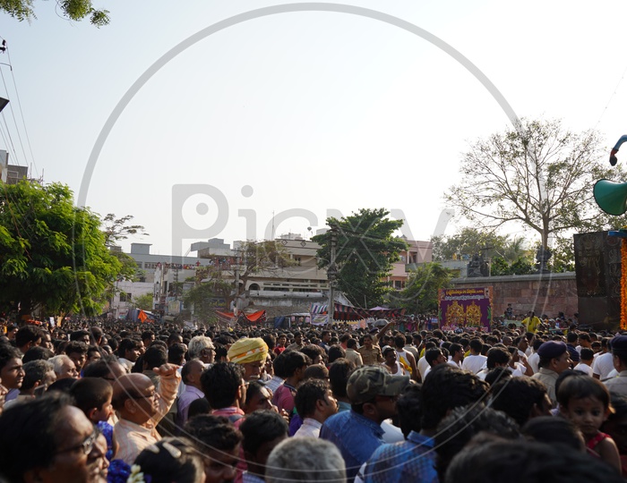 Hindu Devotees  Crowd Attending The Procession of A God At a temple