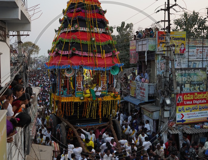 Hindu Devotees Pulling The Wooden Chariot Of Sri Panakala Lakshmi Nsrasimha Swamy in  a  Procession
