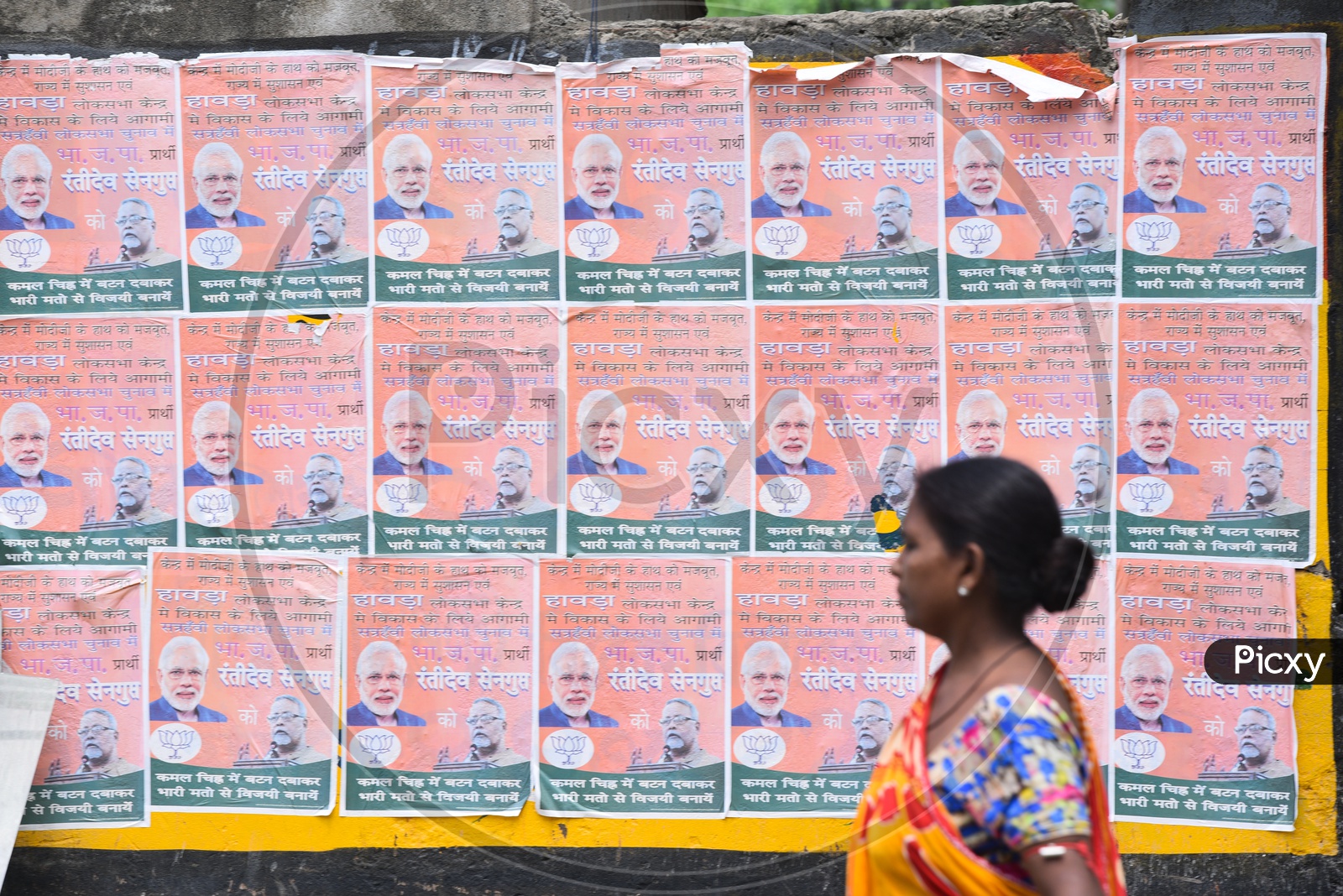 BJP Or Narendra Modi Posters On Street Walls  in Kolkata City As a Part Of Election Campaign