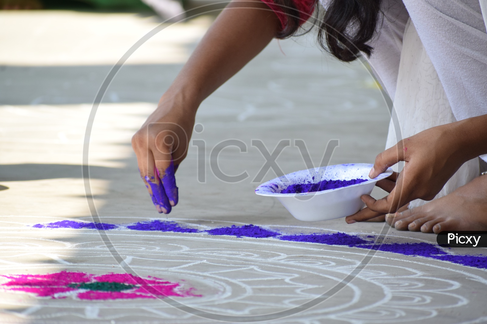 Indian School Girl Making Rangoli