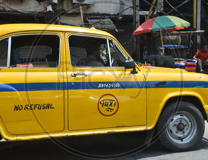 Yellow Color Taxis Or Cabs on The Roads Of Kolkata