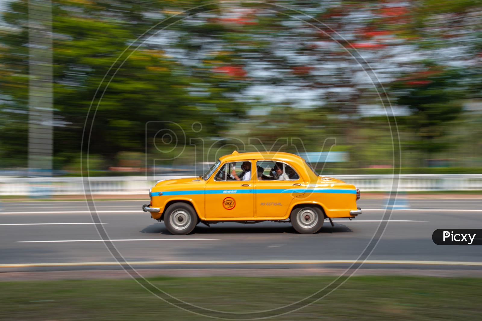 Yellow Color Taxis or Cabs in Kolkata Roads