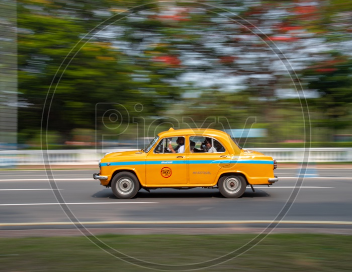 Yellow Color Taxis or Cabs in Kolkata Roads