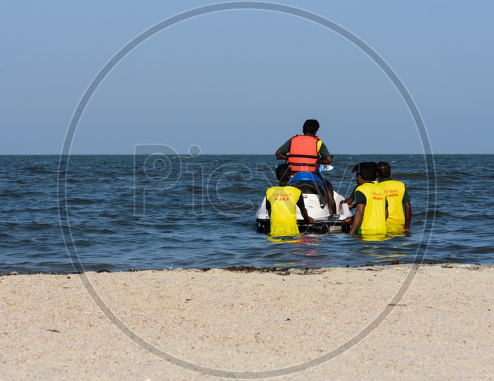 Group of people checking the Jet ski in Tuticorin Muthunagar beach