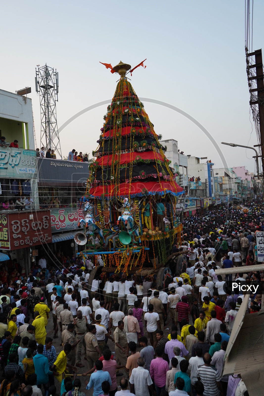 Hindu Devotees Pulling The Wooden Chariot Of Sri Panakala Lakshmi Nsrasimha Swamy in  a  Procession