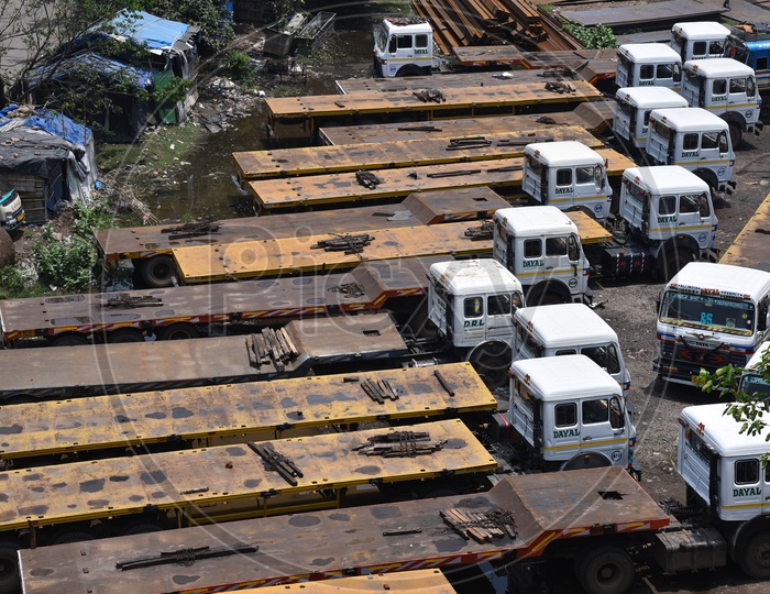 Heavy trolley Lorries Or Trucks  Parked in a Place Side By Side