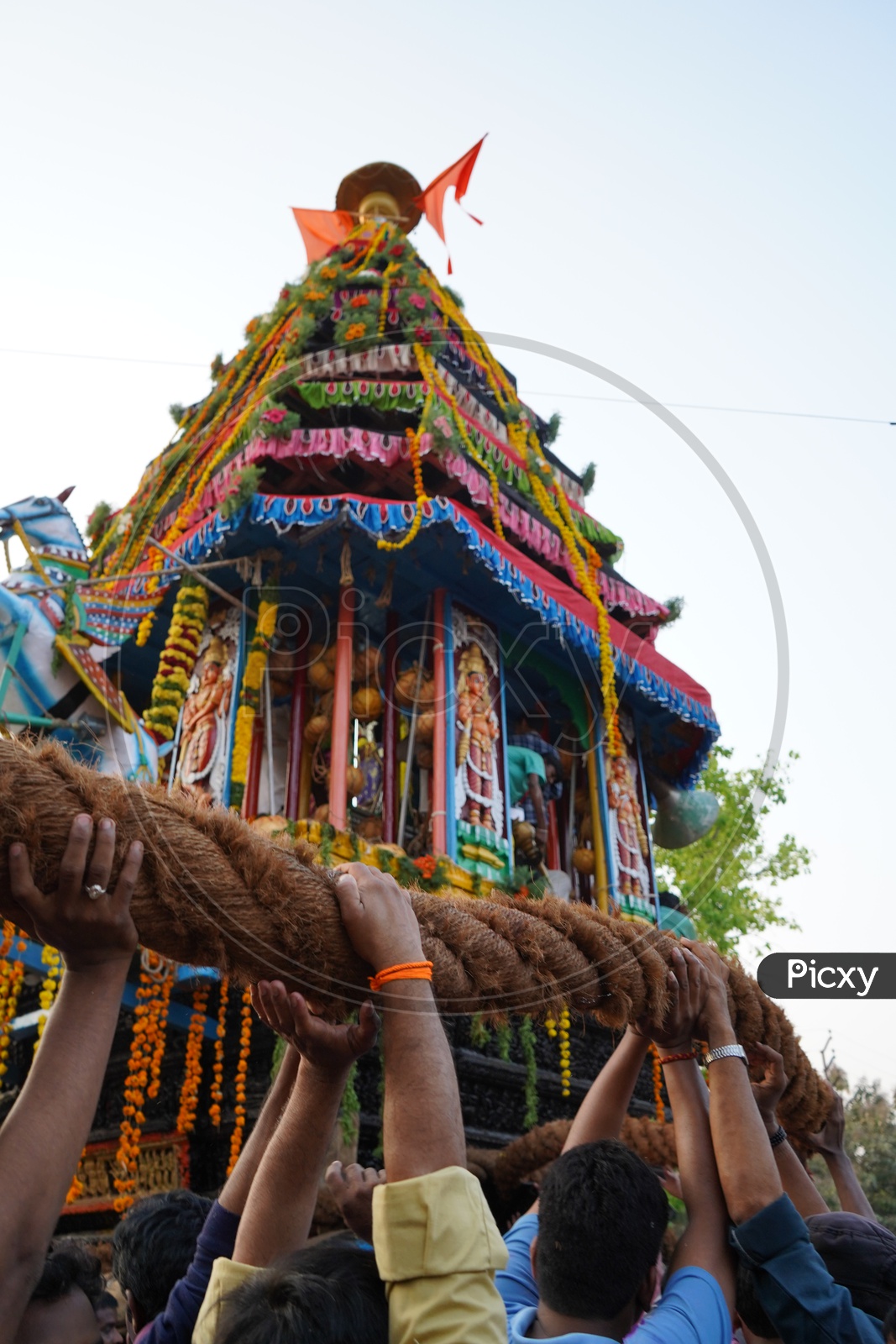 Hindu Devotees Pulling The Wooden Chariot Of Sri Panakala Lakshmi Narasimha Swamy Temple
