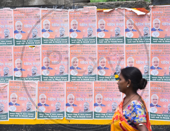 BJP Or Narendra Modi Posters On Street Walls  in Kolkata City As a Part Of Election Campaign