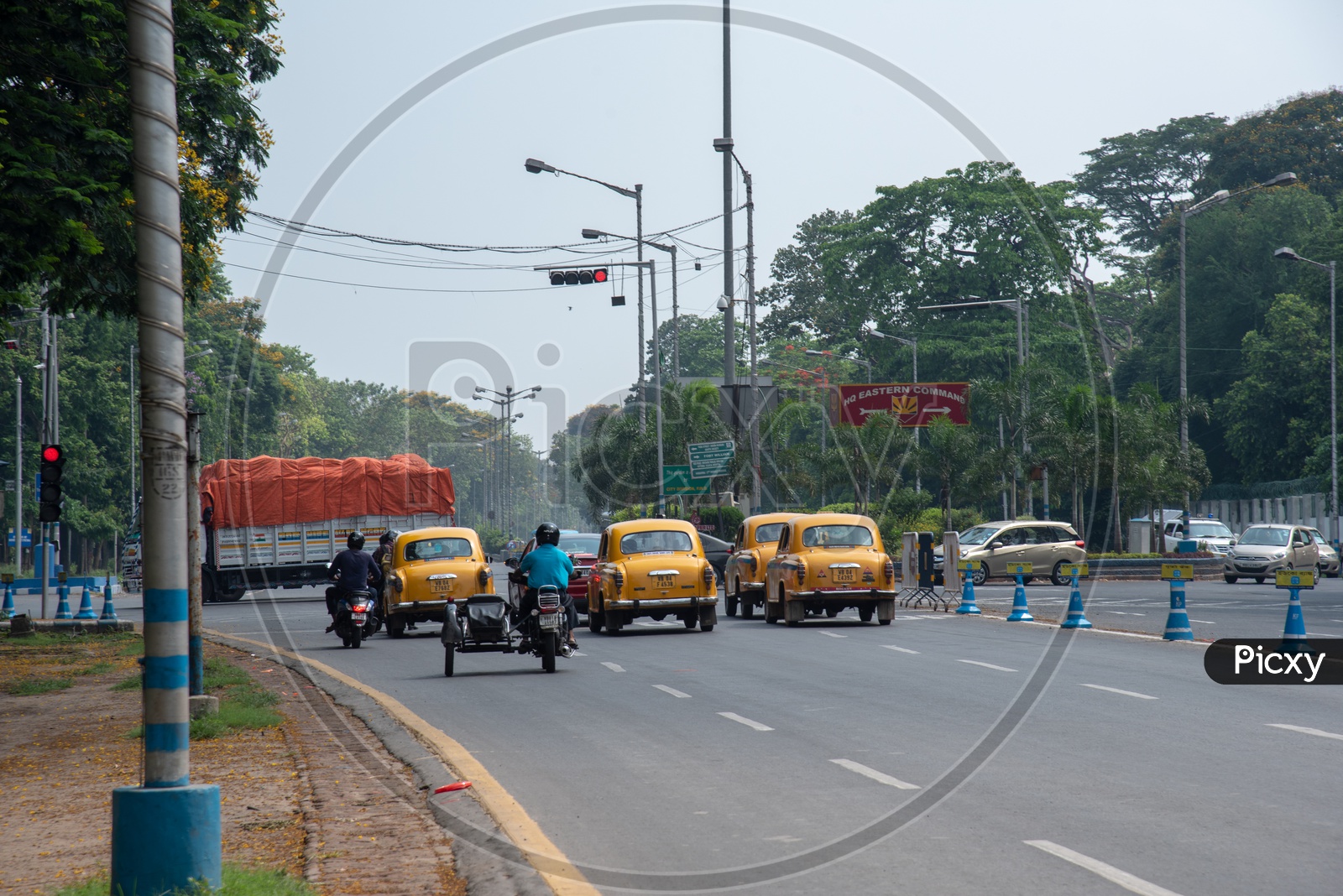 Commuting Vehicles On The Red Road In  Kolkata