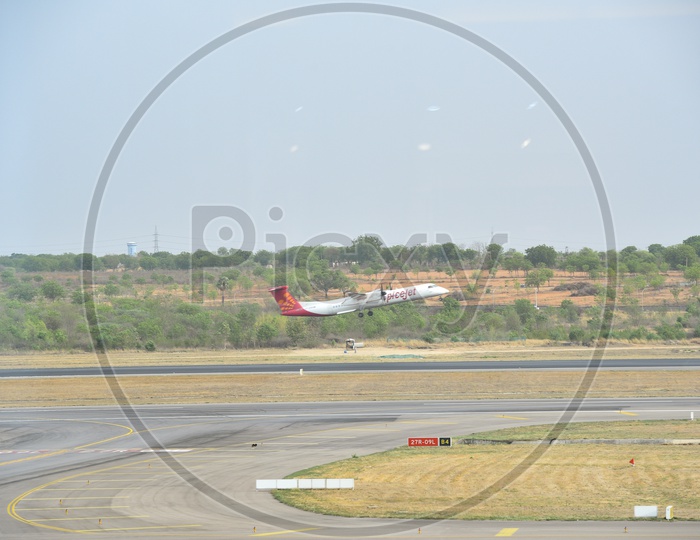Spicejet  Flight  Taking Off From an Airport