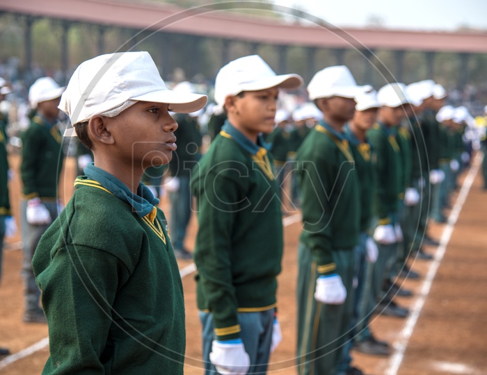 School Children  Wearing Uniform and Attending A Independence Day Parade