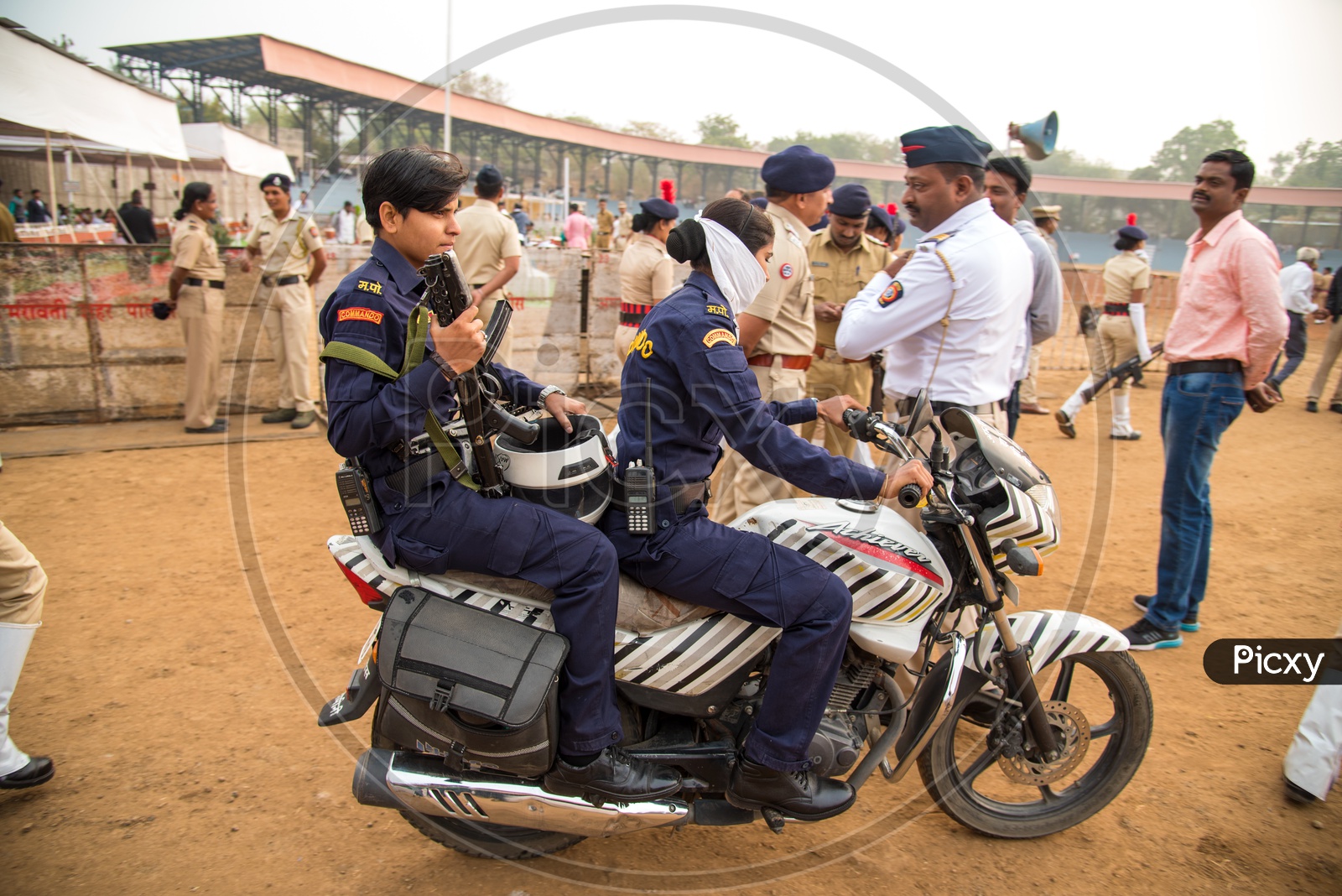 Woman Commando Police Riding Bike  In Independence Day Parade