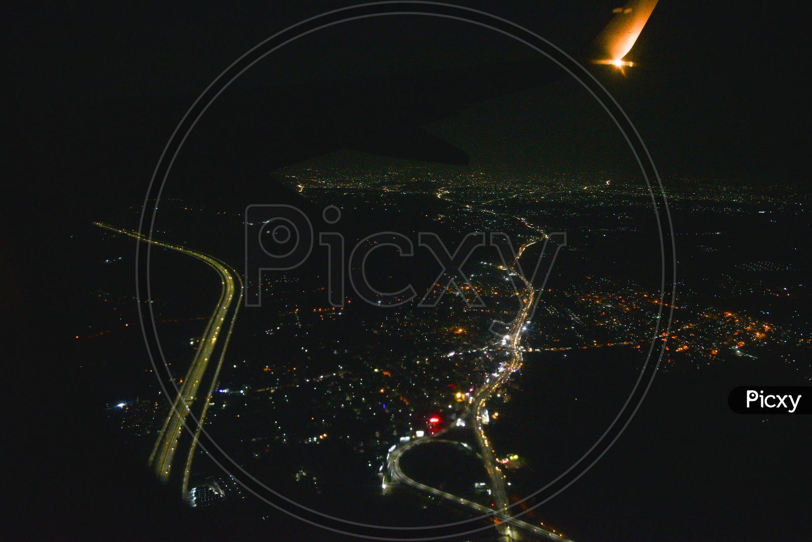 Aerial View Of City Scape Of  Hyderabad And  Roads In Night  Time  From a  Flight Window