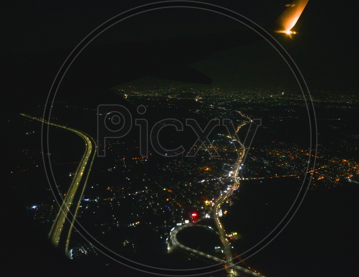 Aerial View Of City Scape Of  Hyderabad And  Roads In Night  Time  From a  Flight Window