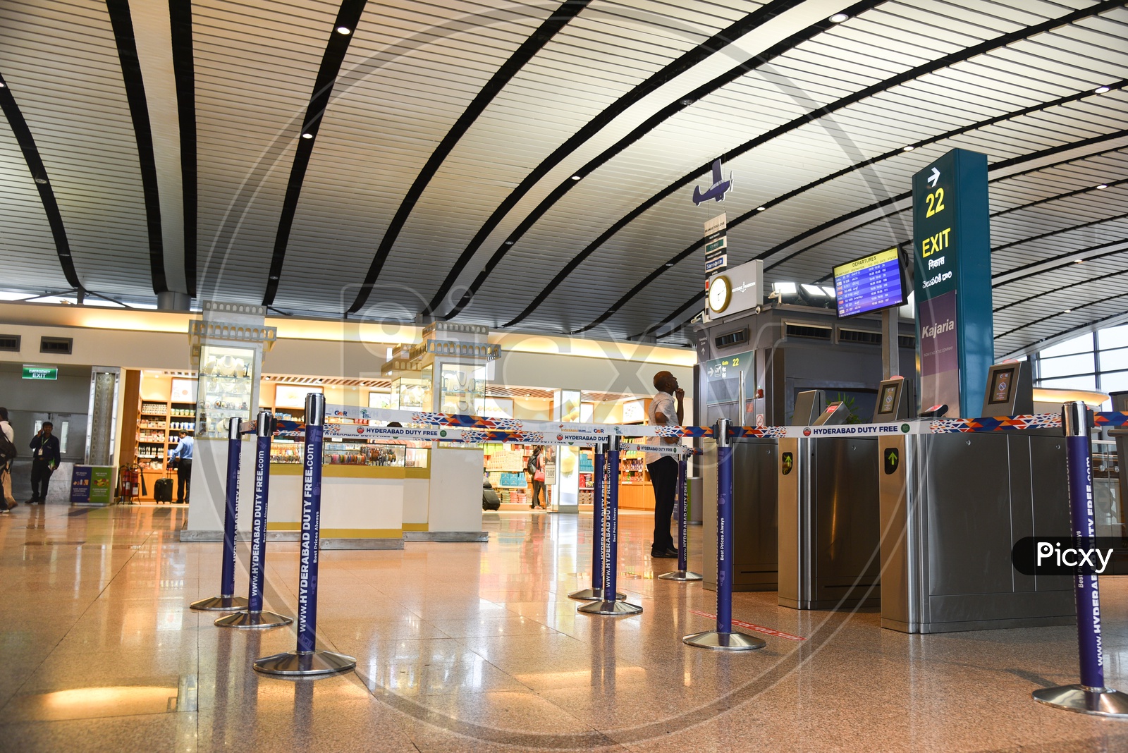 Airport  Scenes  With  Passengers   And Departure Flights  Display Screens