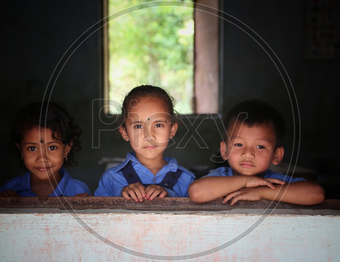 School Children Wearing School Uniforms With Happily Smiling Faces In a Shchool Premise